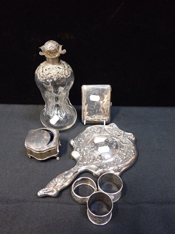 A SILVER MOUNTED DECANTER