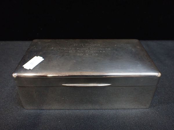 A SILVER CIGARETTE BOX