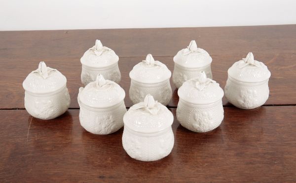 A SET OF EIGHT POTTERY POT DE CREME