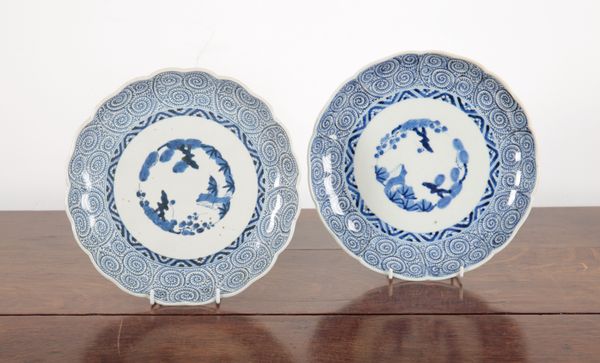 A NEAR PAIR OF JAPANESE PORCELAIN BLUE & WHITE PLATES