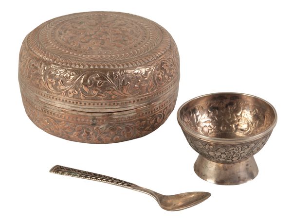 A BURMESE WHITE METAL CIRCULAR LIDDED BOX