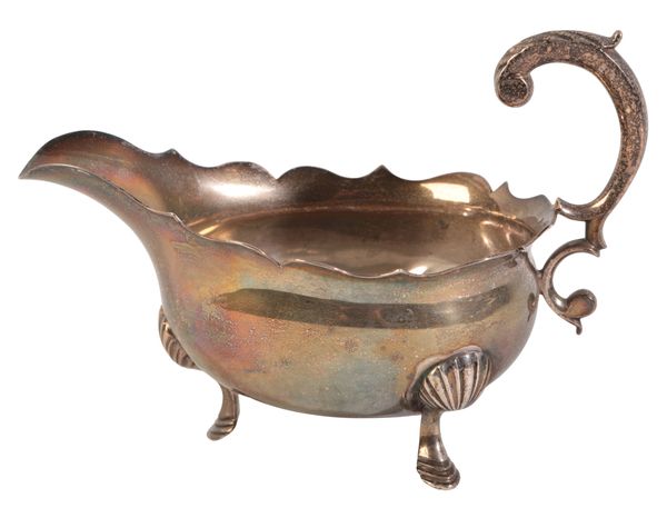 AN 18TH CENTURY WHITE METAL SAUCE BOAT
