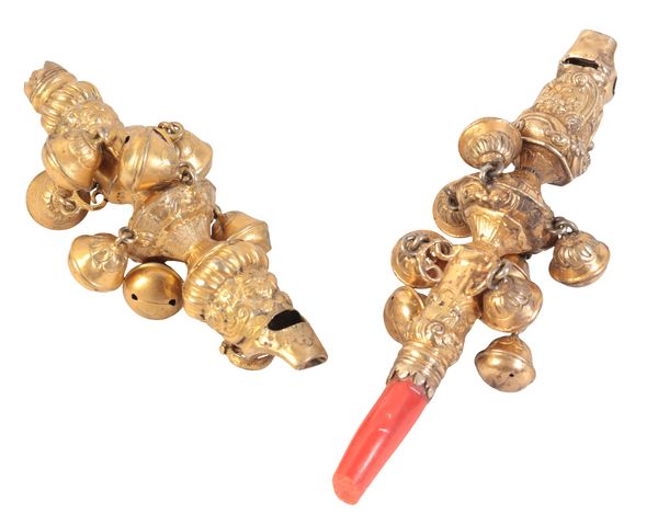 TWO SIMILAR 18TH CENTURY GILDED METAL CHILD’S RATTLES