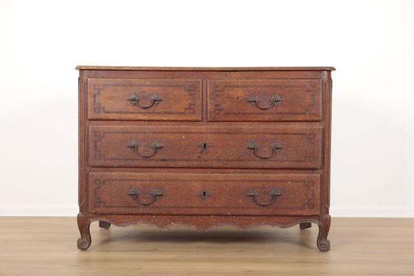 A CONTINENTAL OAK AND PARQUETRY COMMODE