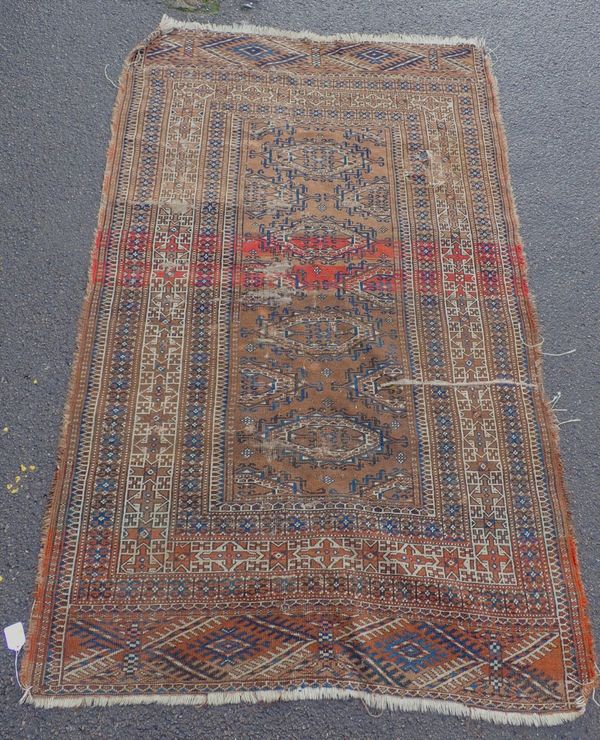 AN OLD TURKMAN RUG