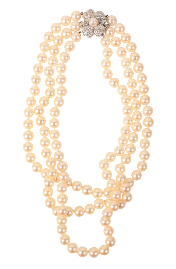 A TRIPLE STRAND CULTURED PEARL NECKLACE