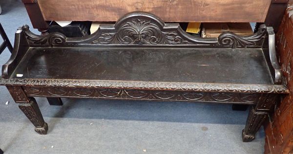 A VICTORIAN CARVED OAK HALL BENCH