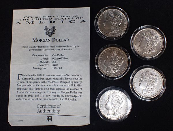 FIVE AMERICAN MORGAN SILVER DOLLARS