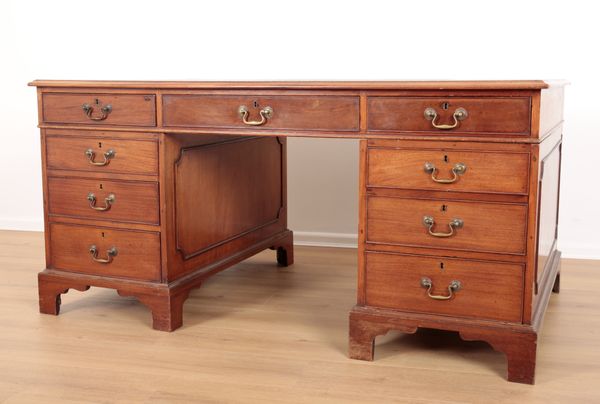 A GEORGE III STYLE MAHOGANY PARTNERS DESK