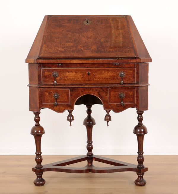 A QUEEN ANNE STYLE WALNUT CORNER BUREAU