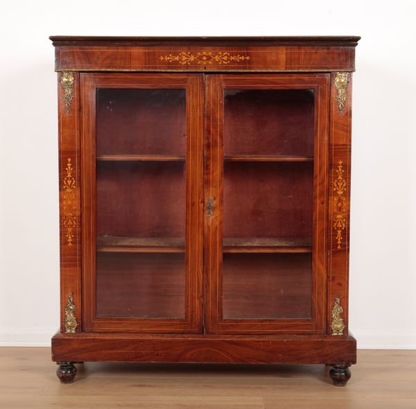 AN EDWARDIAN ROSEWOOD AND GILT METAL MOUNTED SIDE CABINET