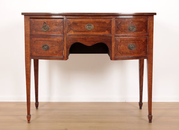 A GEORGE III BOWFRONT SIDEBOARD