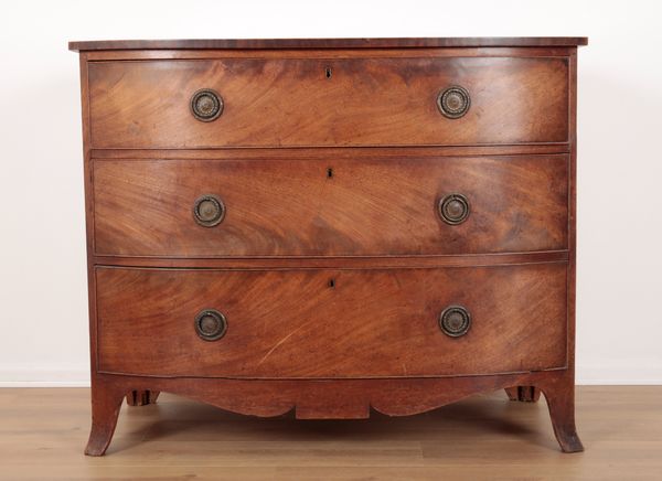 A REGENCY MAHOGANY BOWFRONT CHEST OF DRAWERS