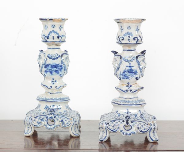 A PAIR OF DUTCH DELFT CANDLESTICKS