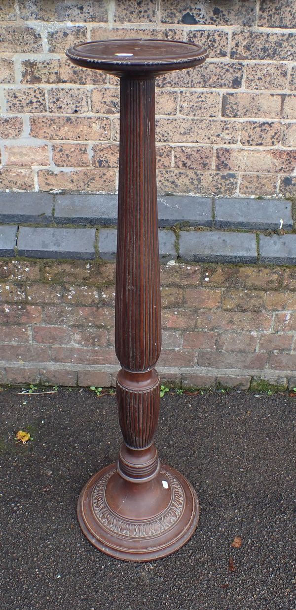 AN EDWARDIAN MAHOGANY TORCHERE