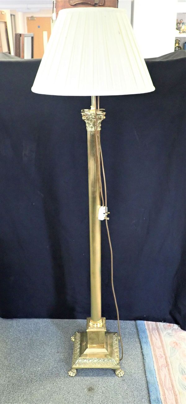 A BRASS STANDARD LAMP