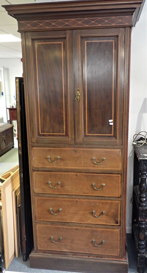 AN EDWARDIAN MAHOGANY WARDROBE