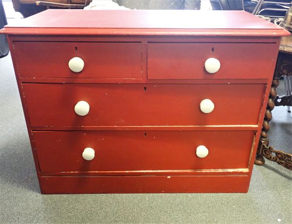 A VICTORIAN RED PAINTED PAINTED CHEST OF DRAWERS