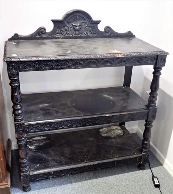 A VICTORIAN EBONISED THREE TIER BUFFET