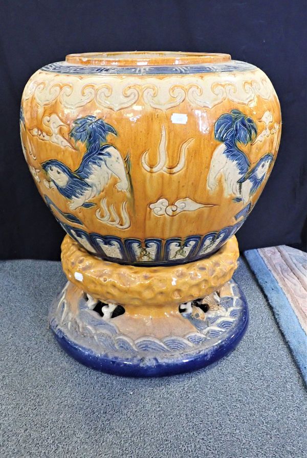 A LARGE CHINESE JARDINIERE AND STAND