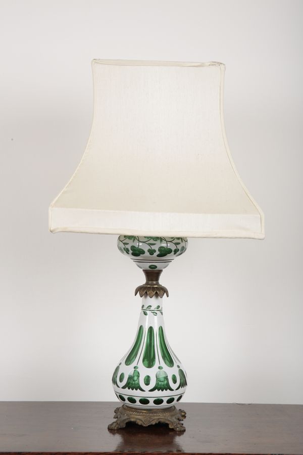 A 19TH CENTURY BOHEMIAN WHITE AND GREEN FLASHED GLASS LAMP