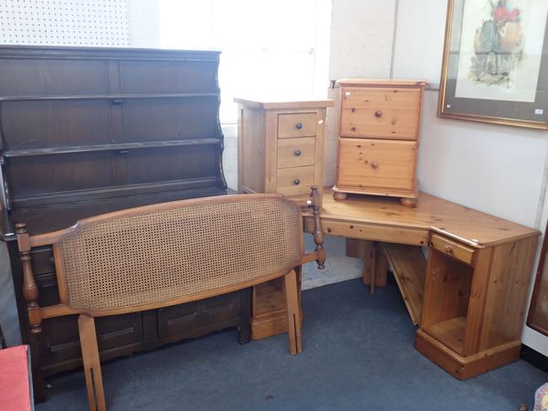 AN ERCOL ELM DRESSER, AN ERCOL CANED DOUBLE BEDHEAD