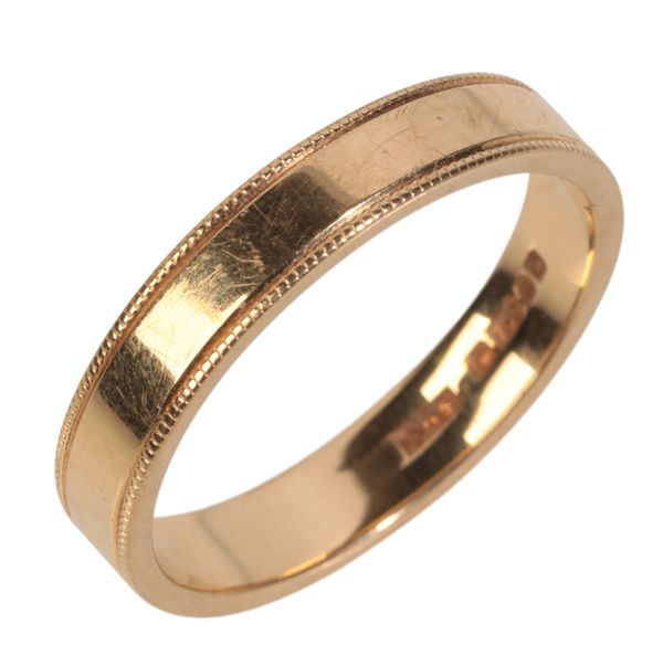 AN 18CT YELLOW GOLD RING