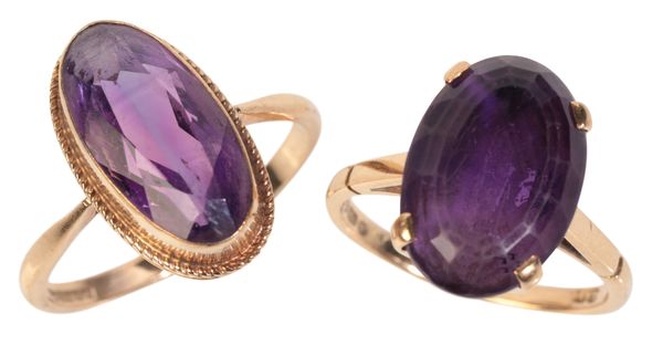 AN 18CT GOLD AMETHYST RING