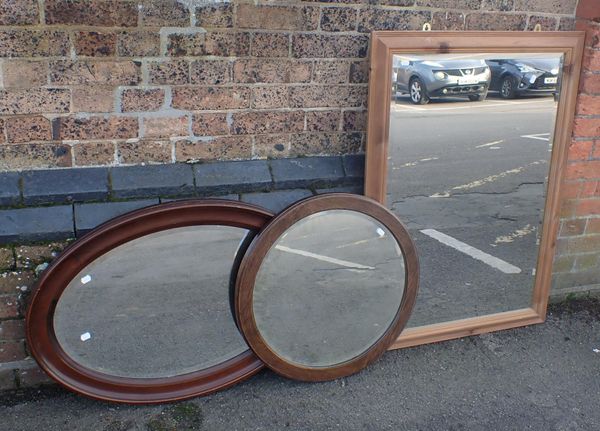 A PINE-FRAMED MIRROR