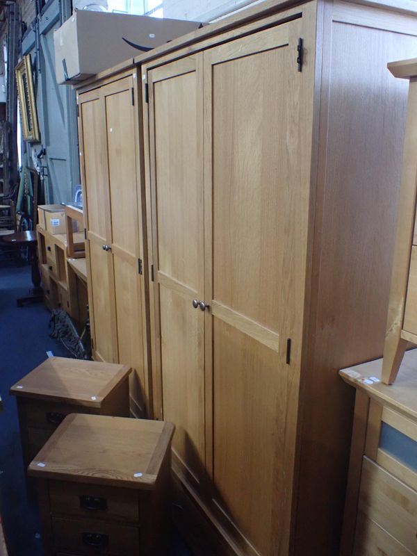 A PAIR OF MODERN OAK WARDROBES