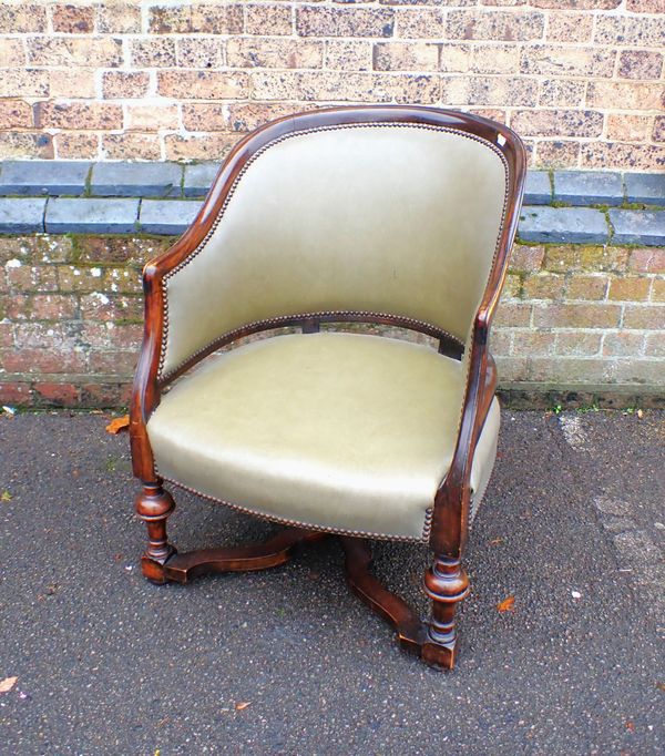 A 1930S MAHOGANY FRAMED TUB SHAPED ARMCHAIR