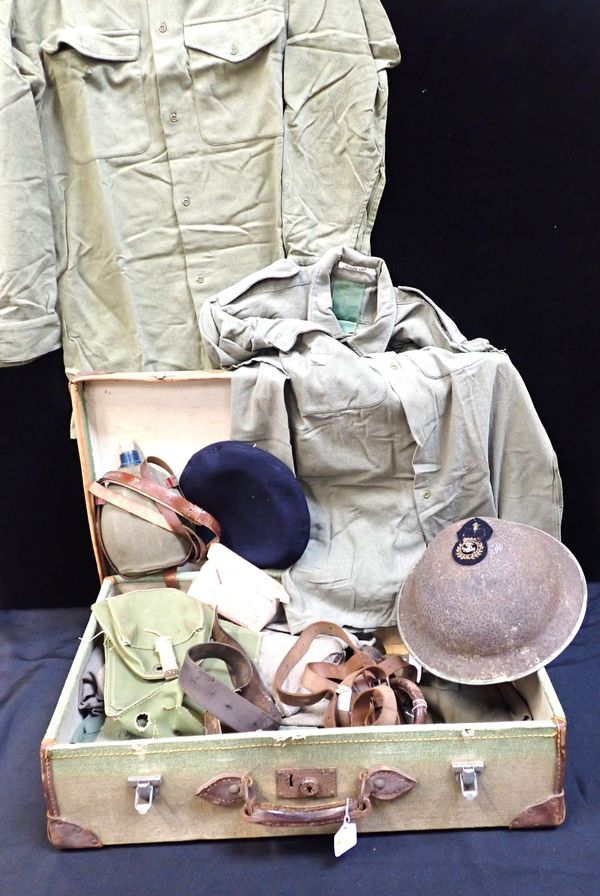 A 1945 DATED DEMOB SUITCASE, WITH CONTENTS