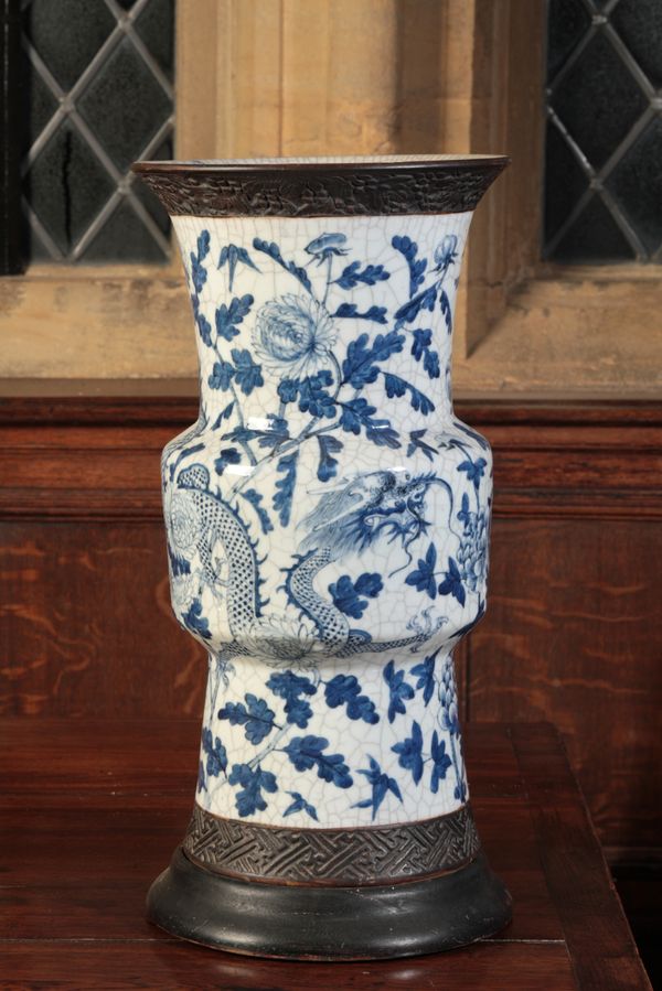 AN ORIENTAL BLUE AND WHITE CRACKLEWARE VASE