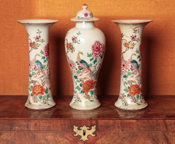 A GARNITURE OF THREE CHINESE EXPORT FAMILLE ROSE VASES