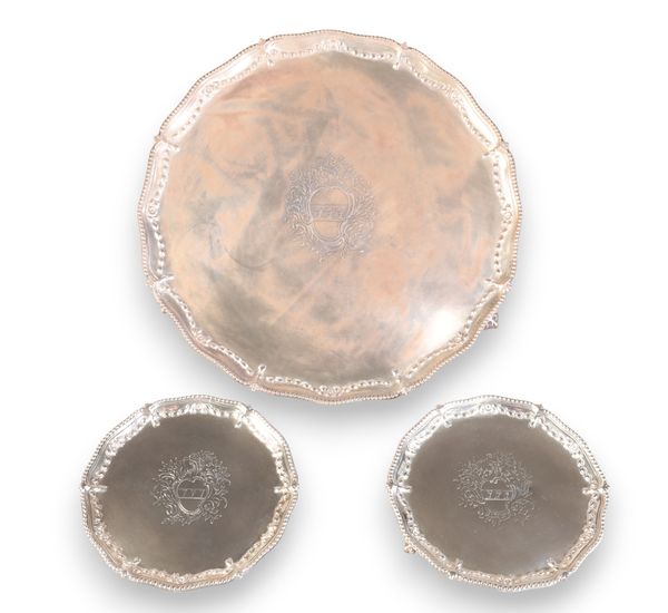 A SET OF THREE GEORGE III SILVER SALVERS