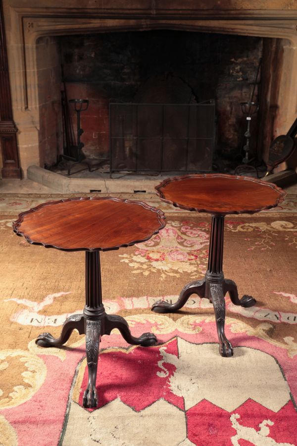 AN IMPORTANT PAIR OF LATE GEORGE II MAHOGANY TRIPOD TABLES