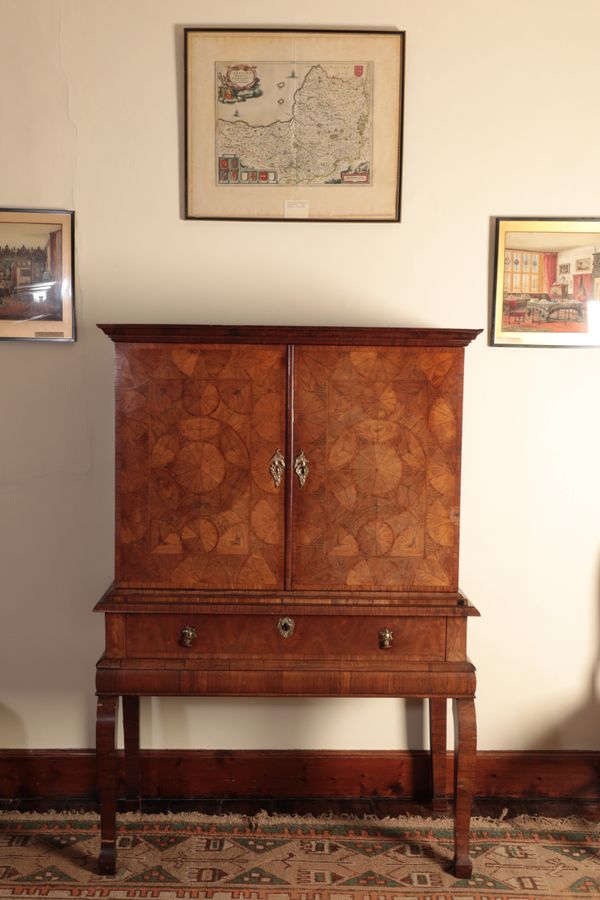 A WILLIAM AND MARY OYSTER VENEERED KINGWOOD CABINET