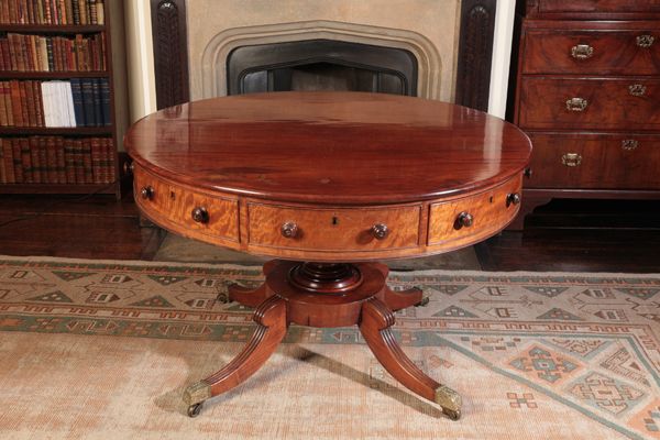 A LATE GEORGE III MAHOGANY DRUM TABLE