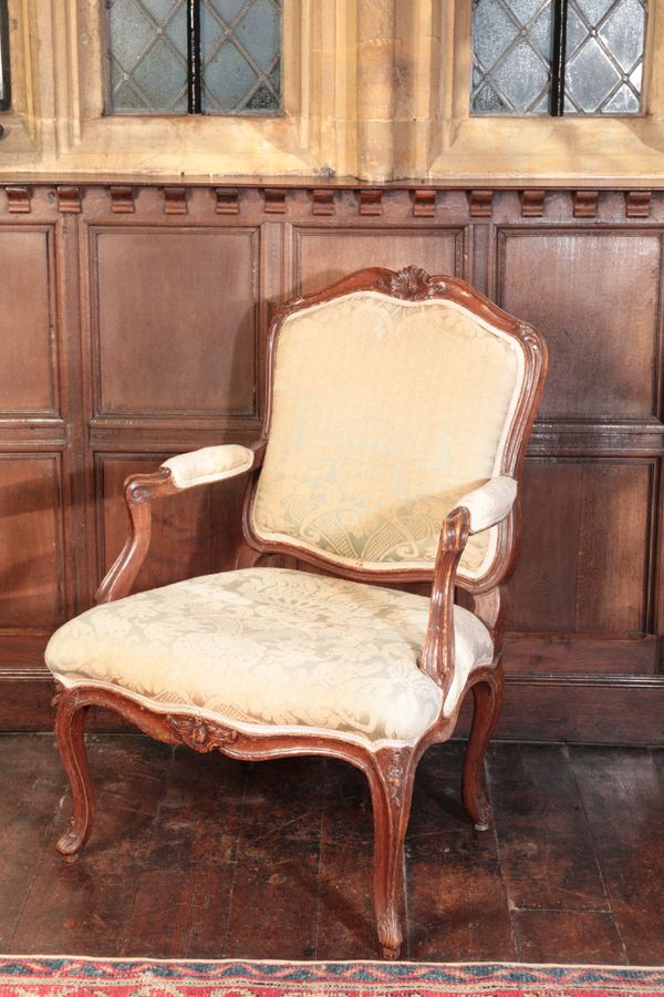 A LOUIS XV BEECHWOOD FAUTEUIL