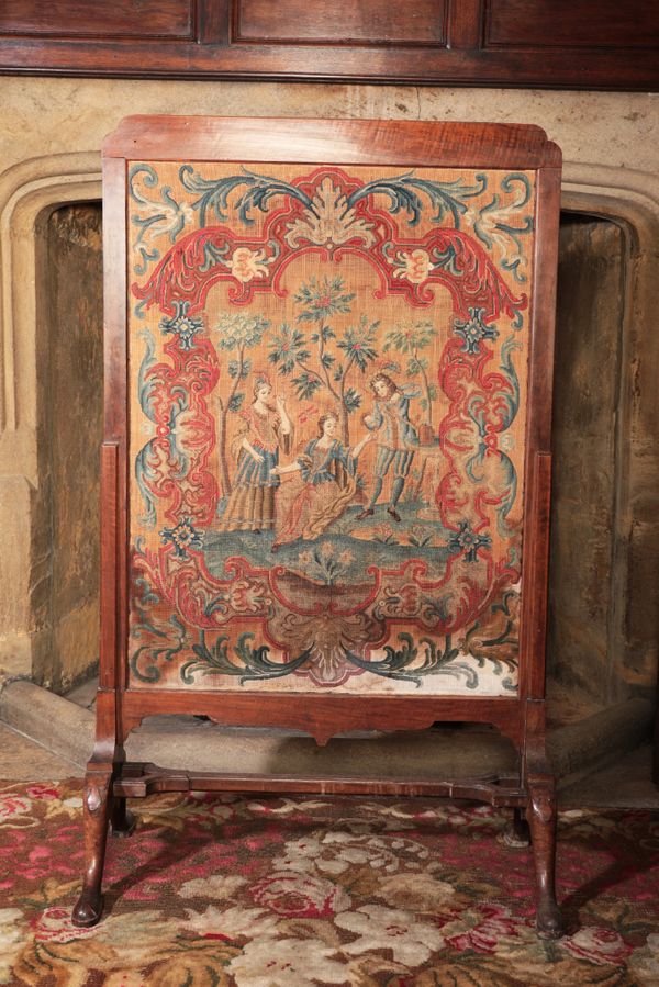 A GEORGE I WALNUT CHEVAL FIRESCREEN