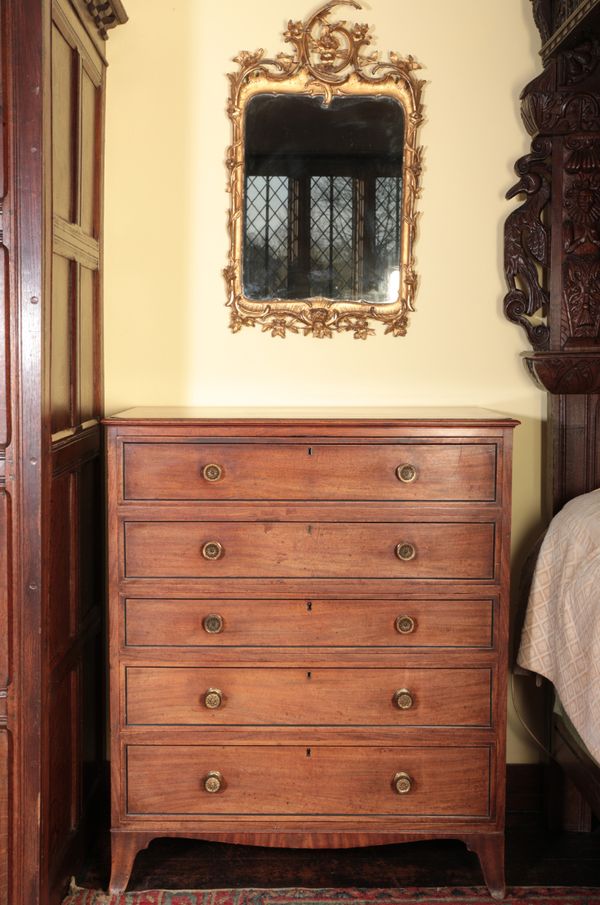 A LATE GEORGE III MAHOGANY SECRETAIRE CHEST