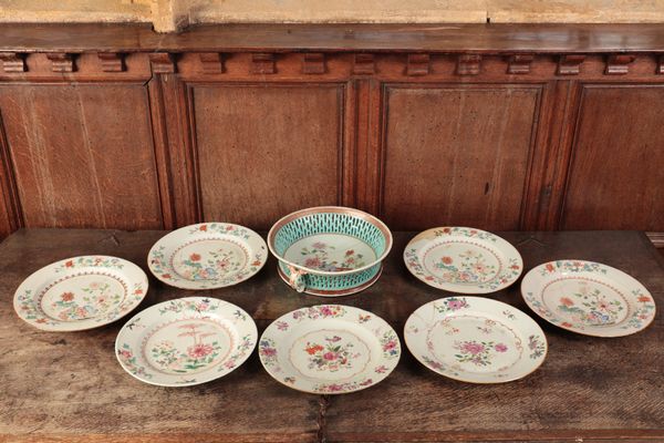 A SET OF FOUR CHINESE FAMILLE ROSE PLATES