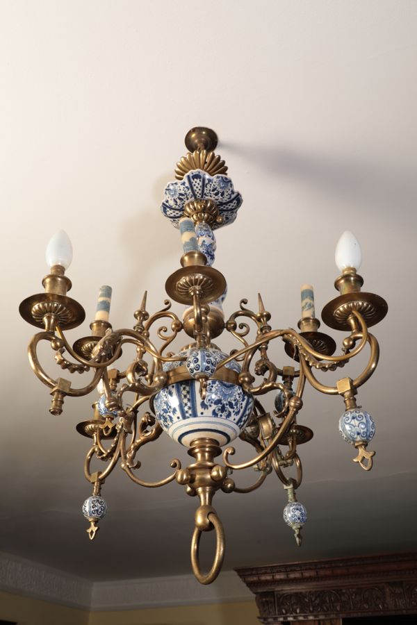 A CONTINENTAL BRASS AND "DELFTWARE" CHANDELIER