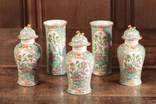 A GARNITURE OF FIVE CANTON FAMILLE ROSE VASES