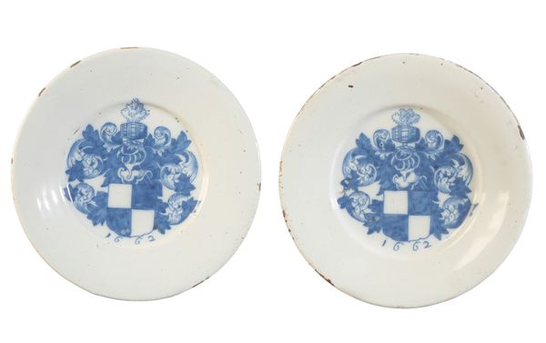 A PAIR OF ENGLISH DELFTWARE ARMORIAL PLATES