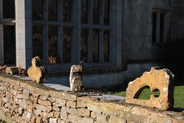 A COLLECTION OF MEDIEVAL AND LATER STONE ARCHITECTURAL ELEMENTS