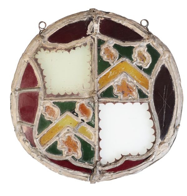 AN ENGLISH HERALDIC STAINED GLASS ROUNDEL