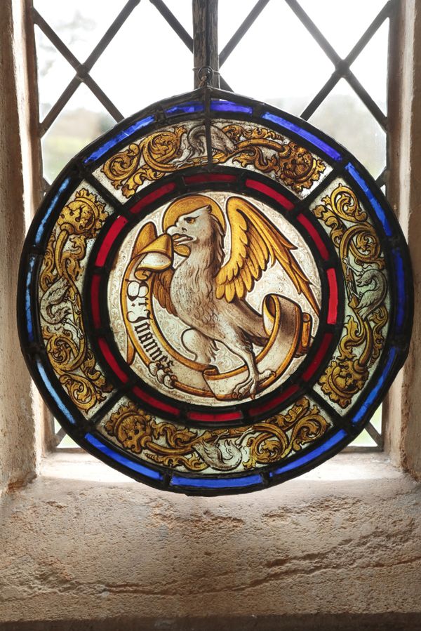 A SET OF FOUR GERMAN STAINED GLASS ROUNDELS