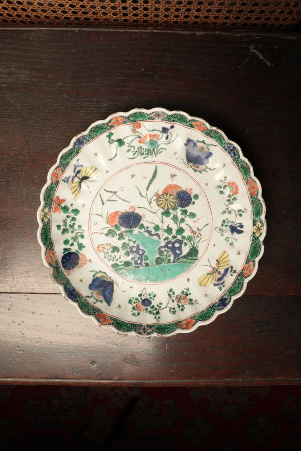 A CHINESE FAMILLE VERTE PLATE