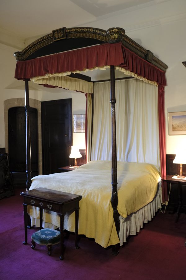 A GEORGE III MAHOGANY FOUR-POSTER BED